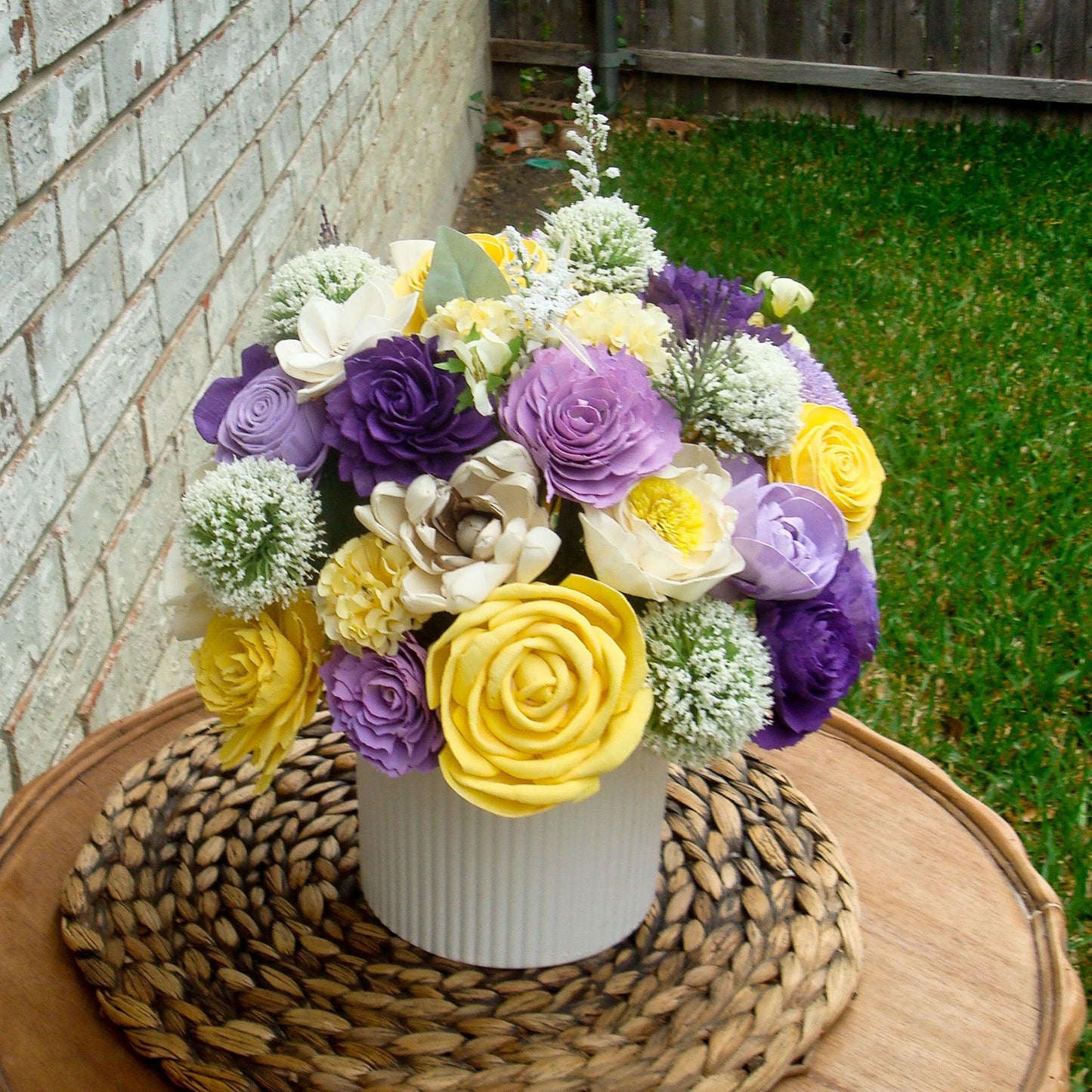 Purple & Yellow Sola Wood Flower Centerpiece in White Vase