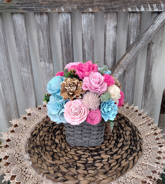Pink, Blue & Natural Sola Wood Flower Centerpiece in Woven Gray Basket