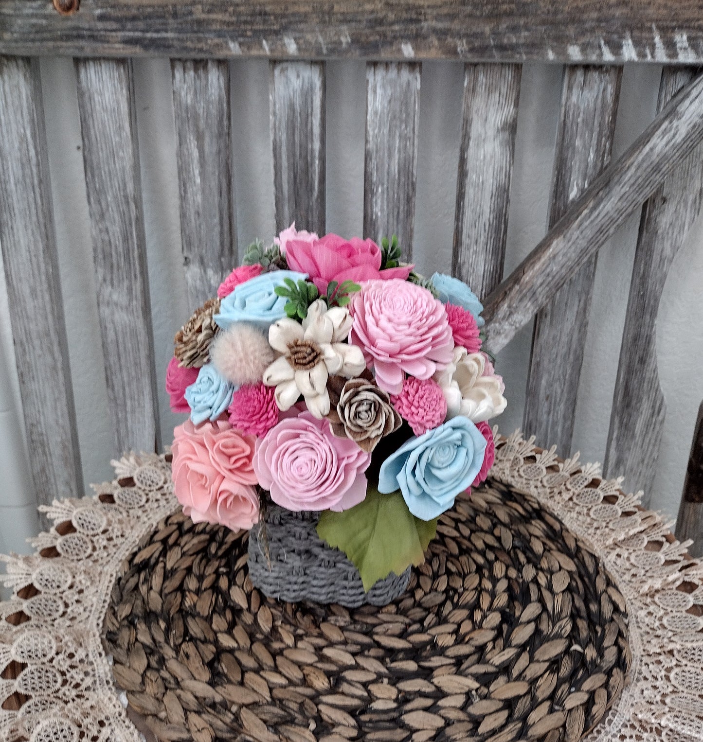 Pink, Blue & Natural Sola Wood Flower Centerpiece in Woven Gray Basket