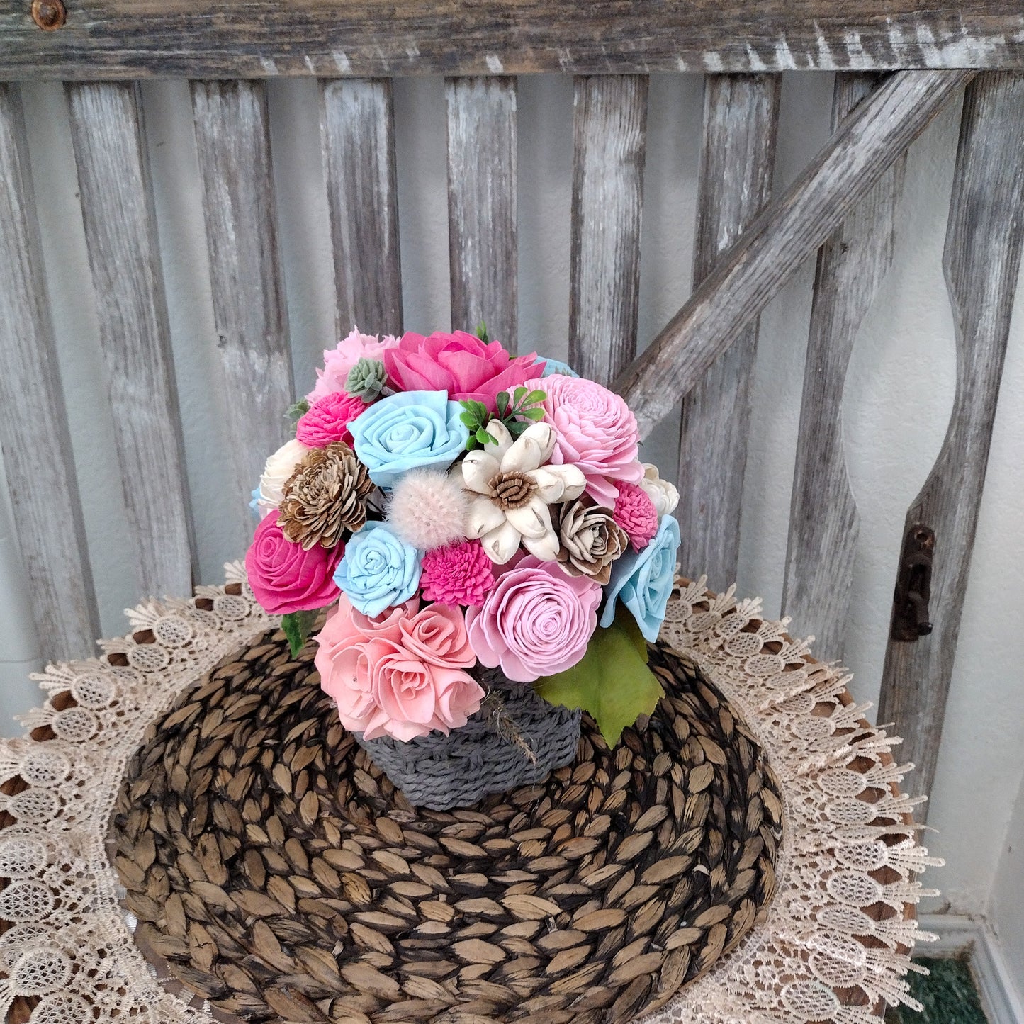 Pink, Blue & Natural Sola Wood Flower Centerpiece in Woven Gray Basket